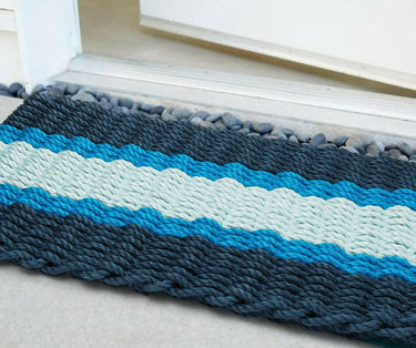 Lobster Rope Doormats, Outdoor Door Mats, Wicked Good Door Mats Made in Maine, Navy, Light Blue, Seafoam, Angled View in Front Door